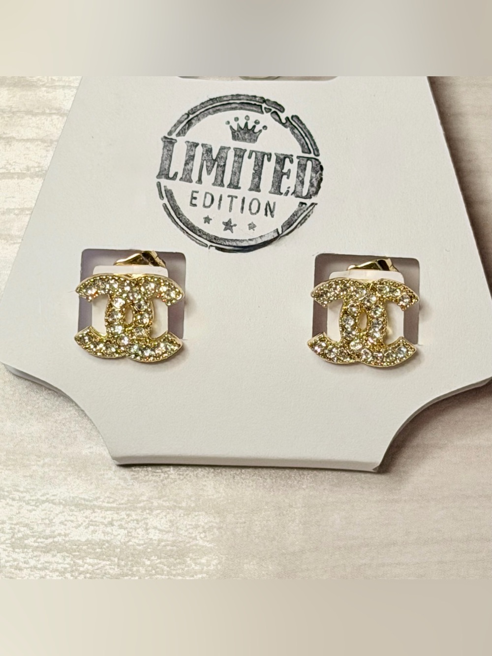 CC Gold Crystal Logo Stud Earrings